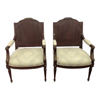 1970s Pair of Double Cane Gilt Wood Heavily Carved Arm Chairs For Sale