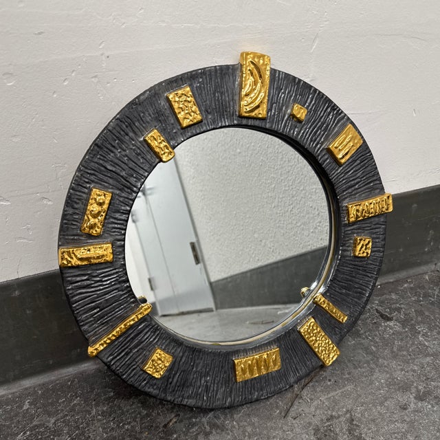 Design Plus Gallery presents the Relief Round Mirror from Jonathan Adler. The circular mirror is surrounded by a textured...