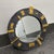 Design Plus Gallery presents the Relief Round Mirror from Jonathan Adler. The circular mirror is surrounded by a textured...