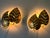 Set of two, large, rare and highly decorative mid-century modern double leaves 'monstera' sconces or wall fixtures....