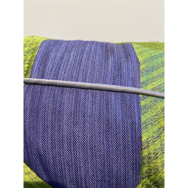 Elevate your interior design with this sophisticated accent pillow, featuring a dynamic geometric pattern that...
