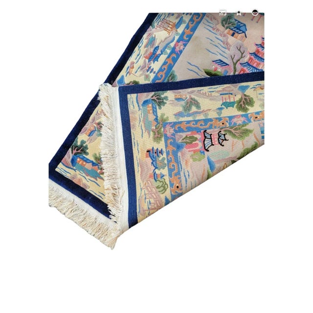 This is a lovely Chinese pictorial area rug depicting vibrant pastoral Asian scenes. Happy pink and blue pagodas dominate...