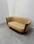 Elegant Art Deco tulip two-seater sofa, sourced from the renowned Hotel Le Malandre. This piece showcases the iconic...