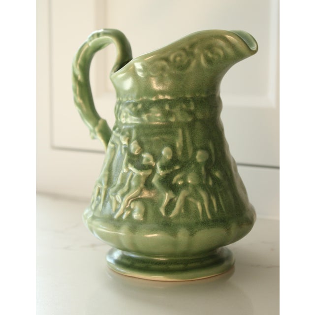 Mid-Century" Camark" raised figural pottery milk pitcher. WE COMBINED SHIPPING If you purchase more than one item you may...