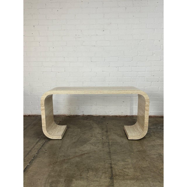 Vintage post modern scroll console table. Item is well preserved with no major areas of wear. Console table or desk is...