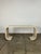 Vintage post modern scroll console table. Item is well preserved with no major areas of wear. Console table or desk is...