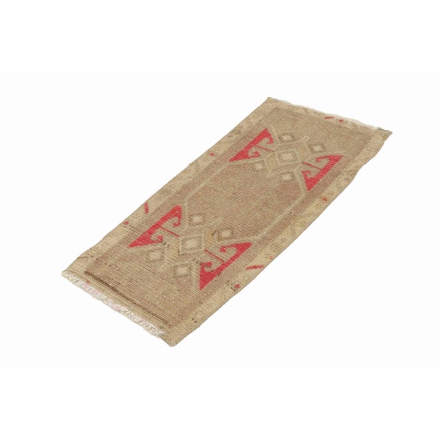 Vintage Handknotted decorative mini rug from Kars region of Turkey. Approximately 45-55 years old. In very good condition.