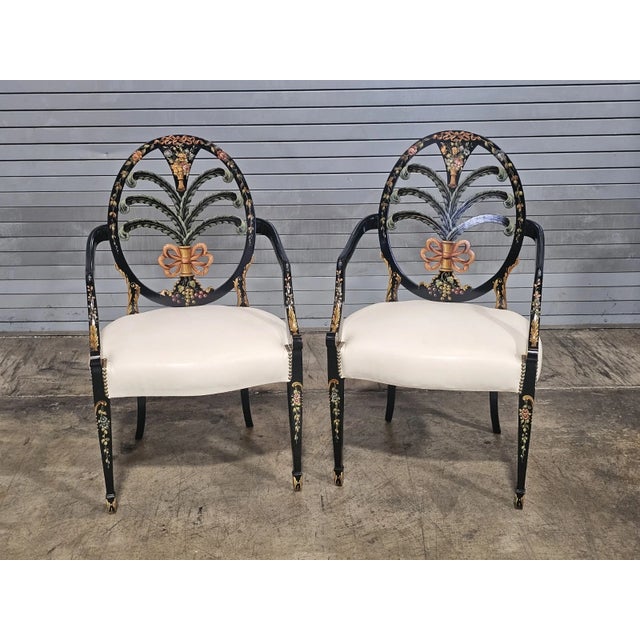 Store Item: Pair of KARGES Hepplewhite Plum Arm Chairs Ebonized, Carved Hand Painted Leather Description: Inspired by the...