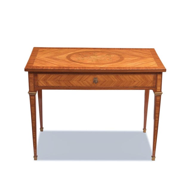 Side table, France, circa 1780, Royalwood veneer, medallion with floral inlay on the top, Sabot feet, full-length drawer,...
