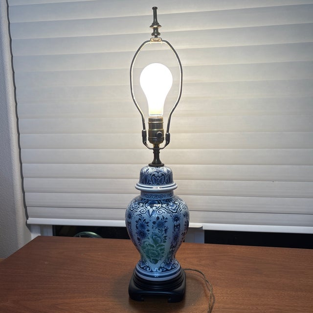Blue and White Pottery Lamp that been attributed to the Royal Delft Factory (De Porcelyne Fles). It takes 7 years to...