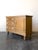 This antique 19th century English pine sideboard features three drawers on the left and a spacious cabinet on the right, a...