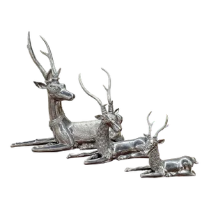 Set of Three Silver Metal Figures of Graduated Deers