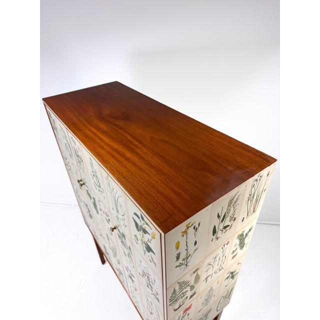 Wood 1950’s Swedish Cabinet With Nordens Flora Illustrations For Sale - Image 7 of 11