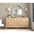 Ribbed rays fan across four hardwood door panels on a 76-inch case, holding shadow along their carved ridges like folds of...