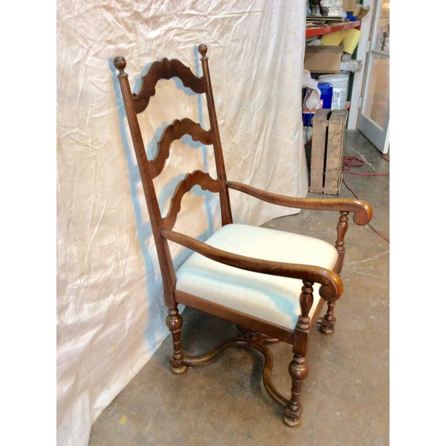 This rustic French walnut ladderback chair is a versatile addition to any room. It is equally at home in a kitchen or...