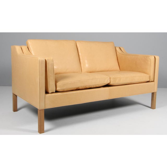 Børge Mogensen two-seat sofa new upholstered with Vacona Sahara full grain aniline leather. Legs of oak. Model 2212, made...