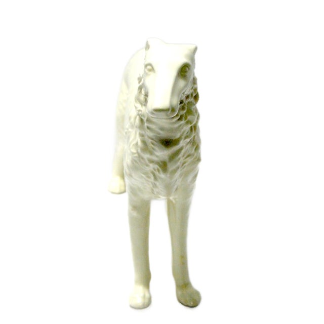Commanding in scale and graceful in form, this vintage Czechoslovakian porcelain Borzoi (Russian Wolfhound) is a...