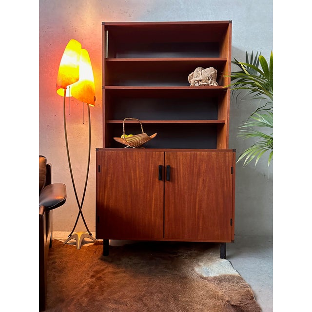 Vintage Pastoe ‘Made to Measure’ wall library cabinet by Cees Braakman. 1950s/1960s. Beautiful slender construction and...