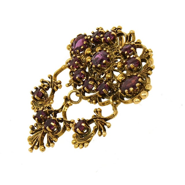 This beautiful antique brooch is crafted from 14k yellow gold featuring a long open design with milgrain and fine bead...