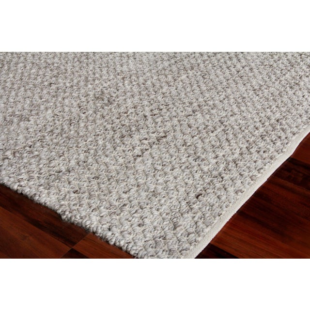 Subtle simplicity was key in creating the sleek and classic design of the Witten rug. Beautifully handwoven with a unique...
