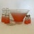 Offering a rare complete Blendo Spray Mist Collection 7 piece Salad Bowl Set by Anchor Hocking in Peach. The Blendo Spray...
