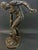 This highly rare bronze of a nude male athlete preparing to left a heavy kettlebell weight was sculpted by an Austrian...