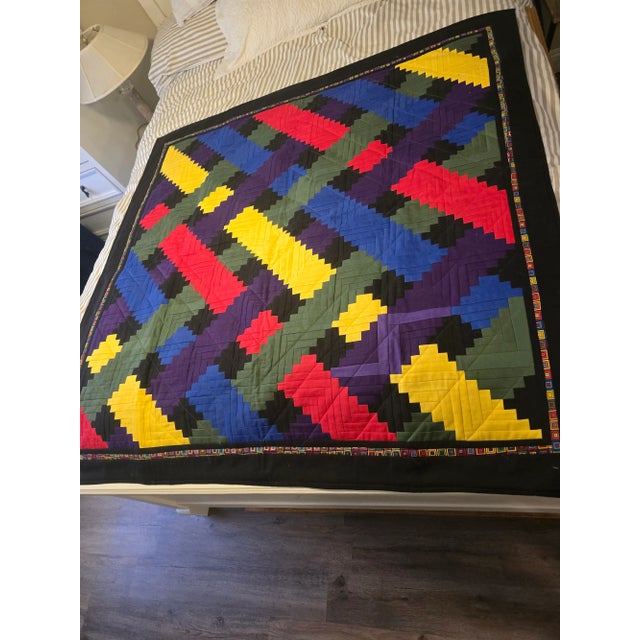 Beautifully handmade quilt can be used as a wall hanging also, the vibrant colors will enhance any living area. The maker...