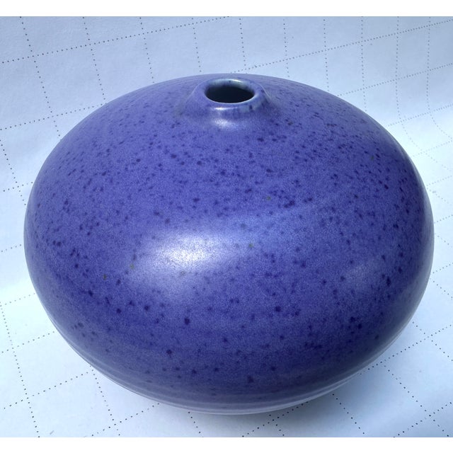 Here we have a beautiful wisteria with black accents glazed vase , wheel turned and a small opening , signed on base ,...