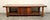 This walnut coffee table is great examples of the strong lines found in mid-century furniture. The piece features two...