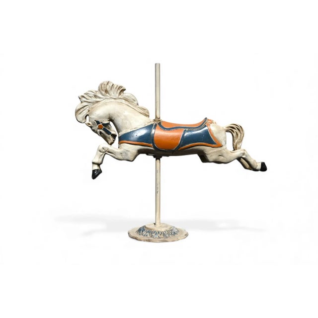 Hand-Painted Metal Carousel Horse – Whimsical Statement Piece Bring the magic of the fairground into your home with this...