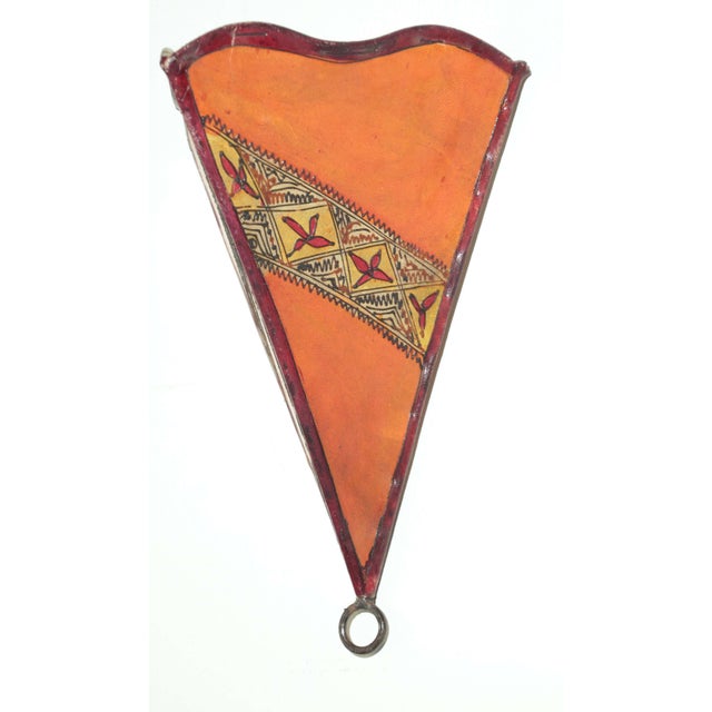 African Tribal Art parchment wall shade sconce featuring a large triangle hide form stitched on iron and hand painted...