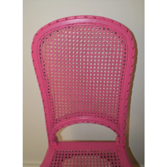 Louis XVI style from France, circa 1920 with ribbon carving all around the frame. The cane of the seat and back is in...