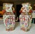 Pair of Chinese Export Rose Medallion porcelain vases (drilled for lamps). They feature panels depicting court scenes...