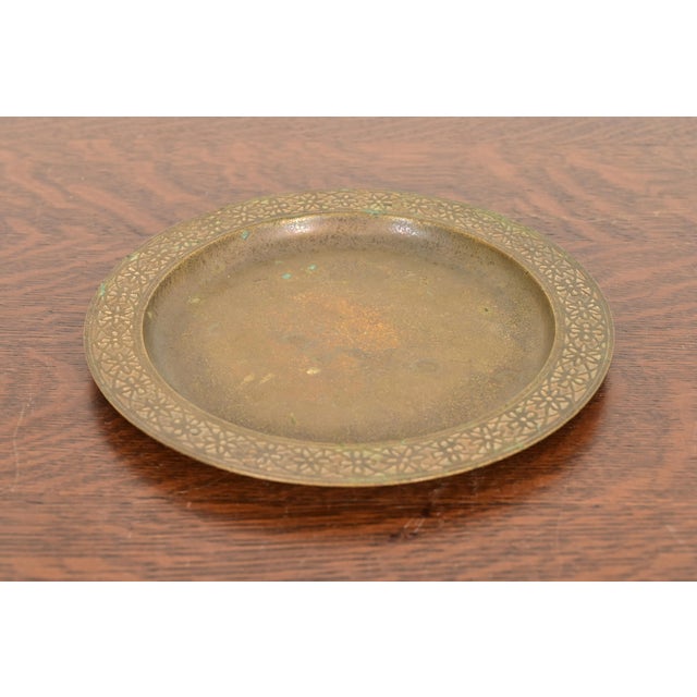 A gorgeous antique Arts & Crafts or Art Deco period gilt bronze plate with decorative border By Tiffany Studios (signed to...