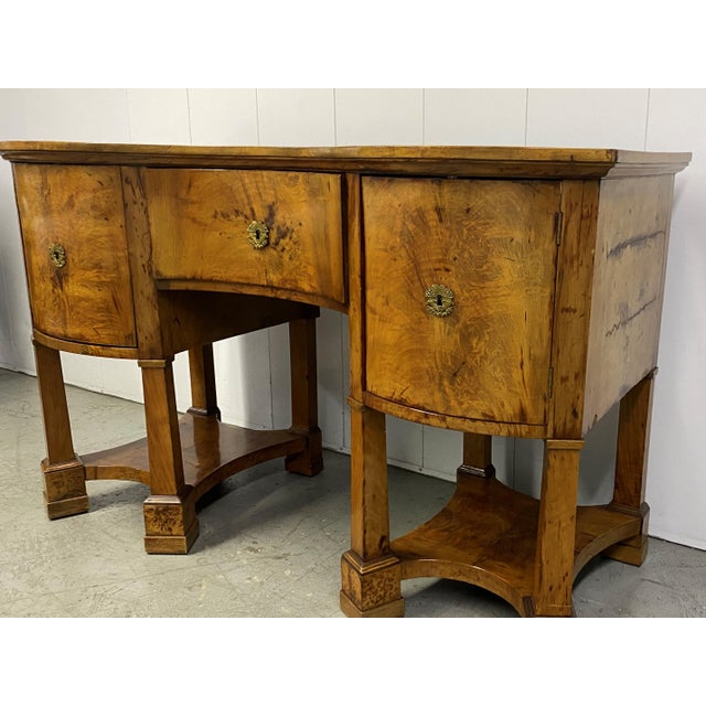 A beautiful burl wood veneer with brass accents and key. Dovetail construction, solid wood. A wonderful addition to any...