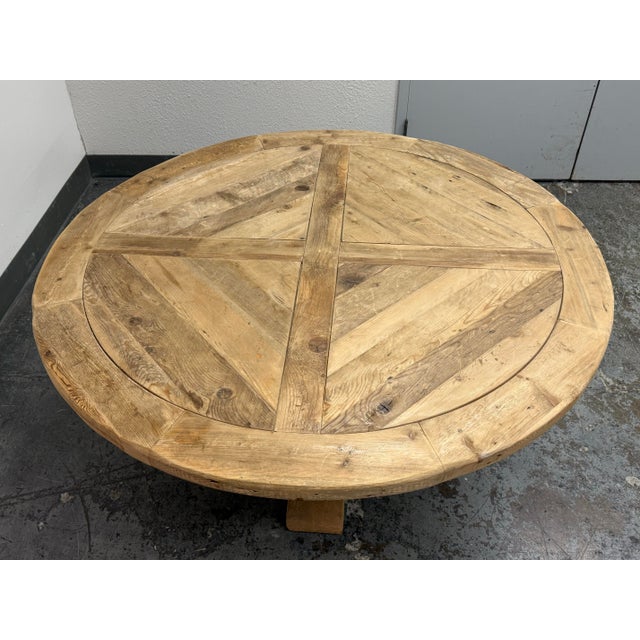 Design Plus Gallery presents the Salvaged Wood Trestle Round Dining Table by Timothy Oulton (1967-2022) for Restoration...