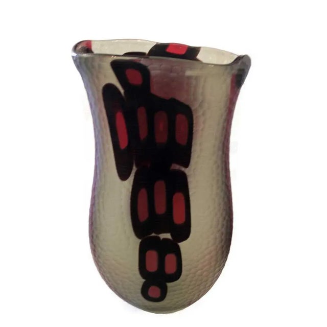 A unique blown glass vase with several techniques involved submerged, murrine and battuto. Rare and precious. Fume blown...