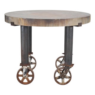 Industrial Style Round Machined Iron Center Table on Casters For Sale