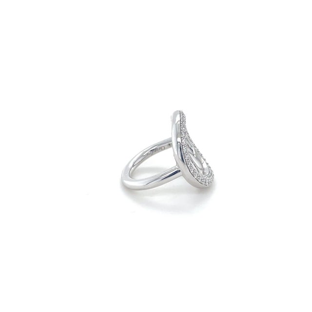 This gorgeous sleek ring by Christofle is in a circular design containing 69 round brilliant cut diamonds weighing...