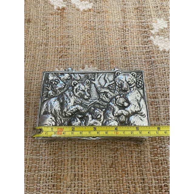 The Vintage Silver Tone Wilderness Bear Arthur Court Trinket Jewelry Box is a unique and charming collectible piece that...