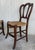 Antique 19th century English Victorian balloon back mahogany library side chairs. Listing features turn carved legs, caned...