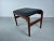 1960s Restored Danish teak footstool reupholstered in black leather. Fully restored Danish footstool in minimalistic yet...