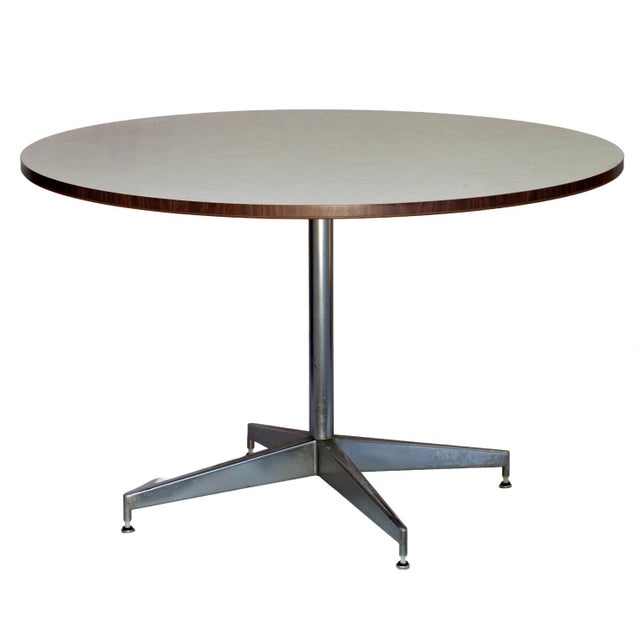 A Mid Century Modern Eames Style 4' Round Table with Formica Top and Metal Base. Kitchen table Height. A Classic MCM...