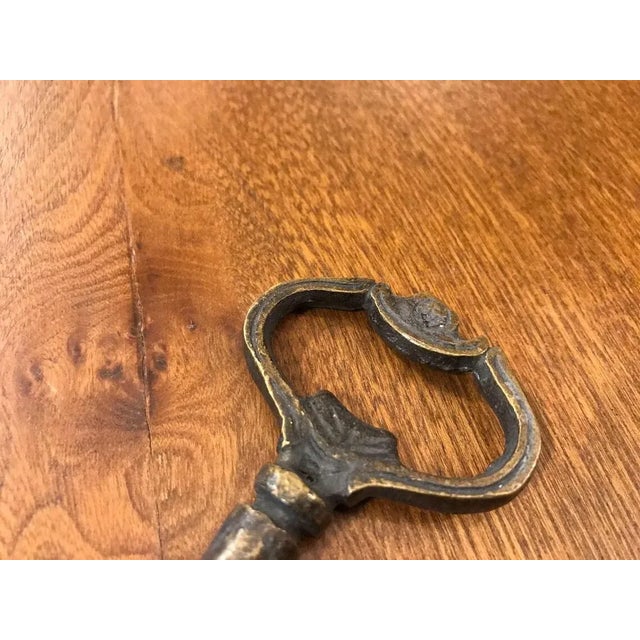 Vintage old door key made by brass with antique design. Great for displaying your unique wall decoration. A fine...