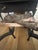This is an exceptional pair of antique English brass and iron fireplace andirons dating to the late Victorian/early...