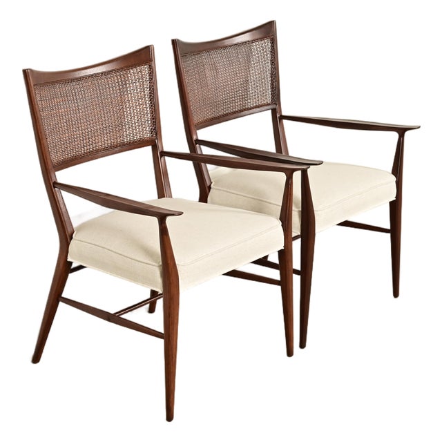 Paul McCobb Irwin Collection Mid-Century Modern Sculpted Walnut Cane Back Armchairs, Newly Refinished For Sale