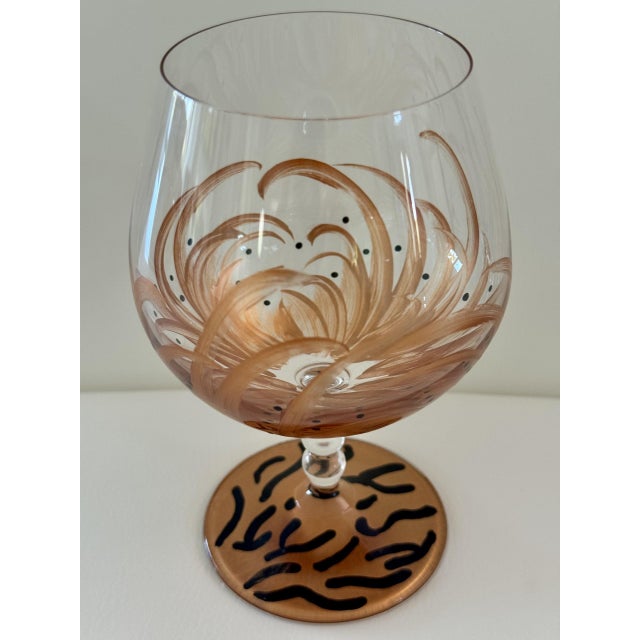 Elevate your fine spirits experience with this exquisite pair of handmade cognac/armagnac glasses. Each glass features...