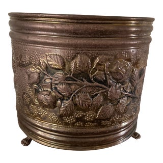 Vintage Claw Footed Embossed Aged Brass Planter/Jardiniere With Grape and Vine Clusters For Sale