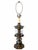 A distinctive vintage Hollywood Regency-style table lamp featuring ornate pineapple-inspired detailing, a warm bronze-tone...