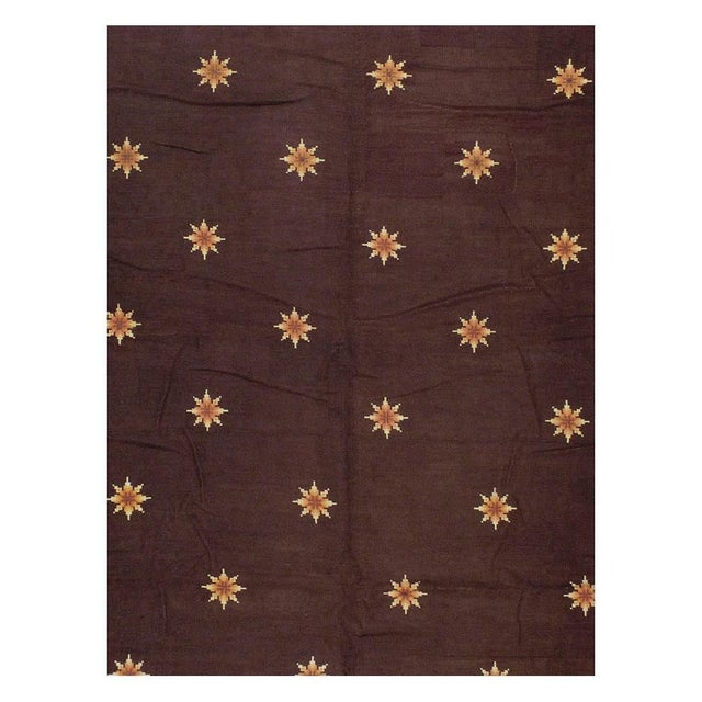 An antique French needlepoint large oversized carpet handmade during the early 20th century. Spaced small stars fill the...